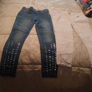 Two pairs of girl skinny jeans